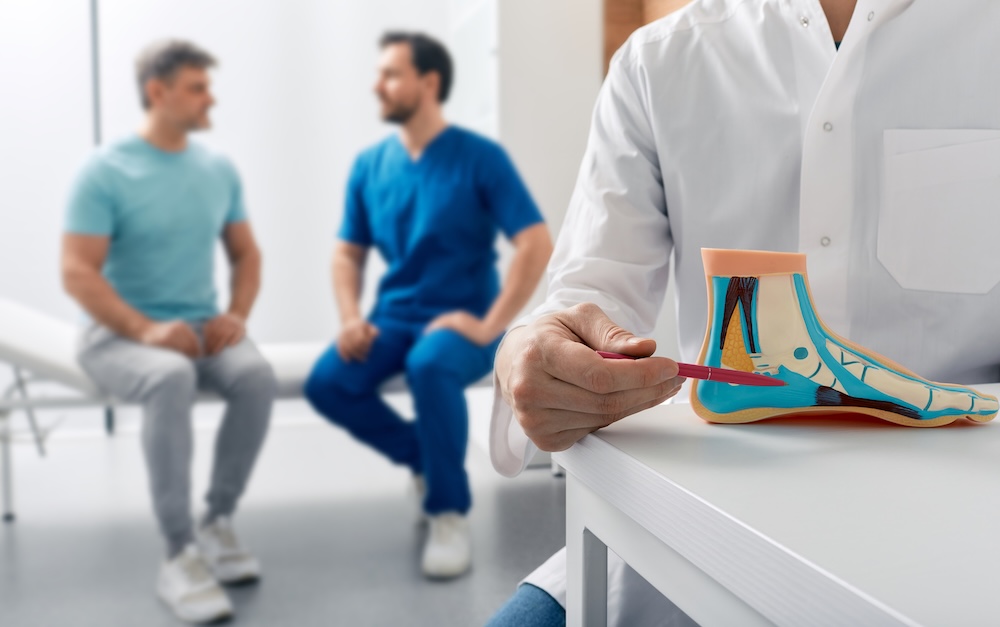 podiatrist talking to patient